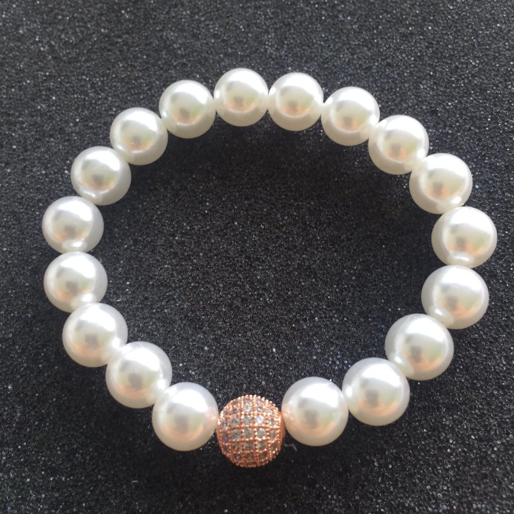 large white pearl with 14k rose gold diamond ball bracelet